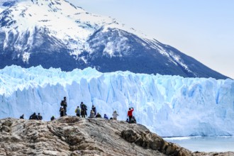 Tourists exploring the stunning Perito Moreno Glacier