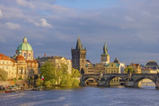 Charles Bridge (Karluv Most) on Vltava river and Old Town Bridge Tower, famous tourist destination