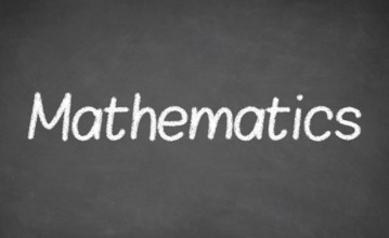 Mathematics lesson on blackboard or chalkboard. written in white chalk