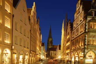 Lamberti Church and town houses at Prinzipalmarkt by night, Münster, North Rhine-Westphalia,