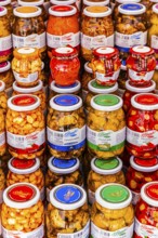 Vegetables in jars on a stall at the Whitsun market in Portoferraio, Elba Island, Tuscan