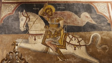 Religious depiction of an armoured rider on a white horse, Thari Monastery, Moni Thari, near