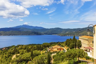 View of the Stella Gulf from Capoliveri, Monte Capanne in clouds in the background, Elba Island,