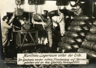 Underground ammunition storage room. The shells are lifted onto carts using a pulley and brought to