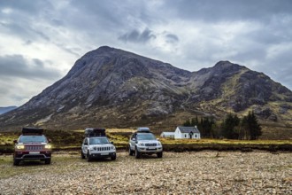 4x4 cars in Wee White House Glencoe, Glencoe, Scotland, United Kingdom, Europe