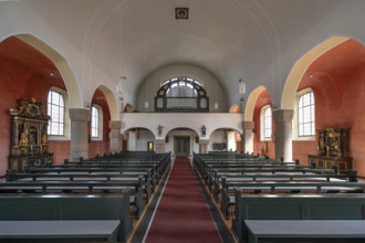 Interior with organ loft of St Stephen's Church, Art Nouveau building designed with neo-Romanesque