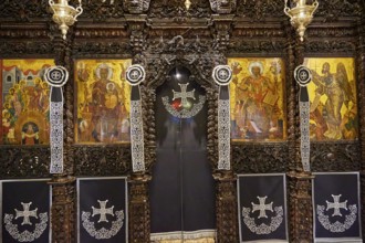 Altar wall, series of religious icons and symbols in graphic style with elaborate decorations, Holy