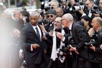 Cannes, France - 19.5.2024: Denzel Washington jokes with photographers during the - Highest 2
