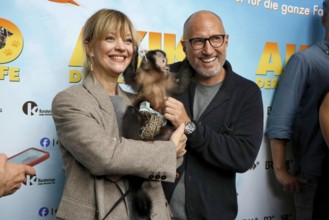 Heike Makatsch and Benno Fürmann at the Berlin premiere of AKIKO - DER FLIEGENDE AFFE at the