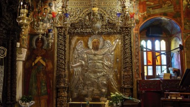 Archangel Michael, Detailed depiction of angel statues and icons, richly decorated in the church