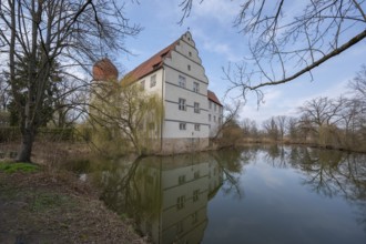 Moated castle, originally a manor house, converted into a Renaissance castle between 1612 and 1618,