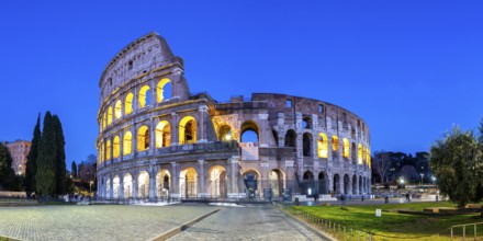 Colosseum ancient amphitheatre panorama at night in Rome, Italy, Europe