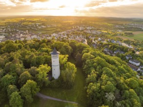 Landscape with tower in the forest at sunset and view of the village, Engelberg Tower, Leonberg,