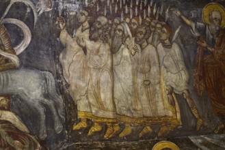 A group of saints in fresco, all in procession, showing religious fervour in medieval art, Easter