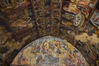 Ceiling frescoes with religious scenes and saints illustrated in golden and dark tones, Easter