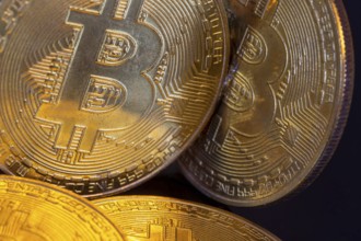 Close-up of symbolic bitcoins