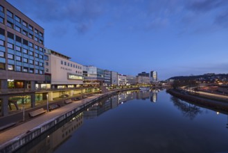River Saar, modern architecture, trees, fashion shop, Primark, reflections on the water surface,