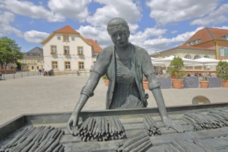 Sculpture Asparagus Woman by Franz Müller-Steinfurth 1990, market woman, market stall, sale,