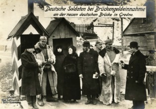 German soldiers collecting bridge money at the new German bridge in Grodno, 1914 - 1918, World War