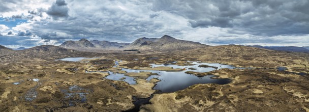 Panorama of Rannoch Moor from a drone over Loch Ba and Loch of the Armpit, A82 Highland Way, Argyll