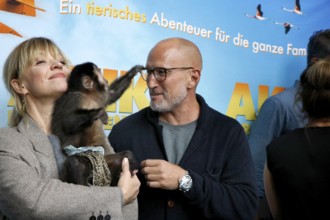 Heike Makatsch and Benno Fürmann at the Berlin premiere of AKIKO - DER FLIEGENDE AFFE at the