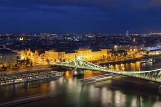 Evening panorama of Budapest with the Danube and the Liberty Bridge in the foreground