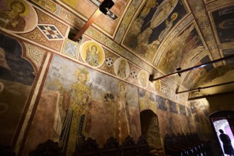 Historic church art with frescoes on the walls and vaulted ceiling, atmospheric lighting, Thari