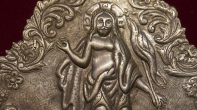 Silver engraved image of a saint with elaborate ornaments, Museum of Icon Painting, Thari