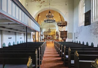 Evangelical Lutheran parish church of St. Johannis, view through the nave to the altar, Nieblum,
