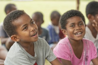 Kids in an outdoor school, Yasawa islands, Fiji, Oceania