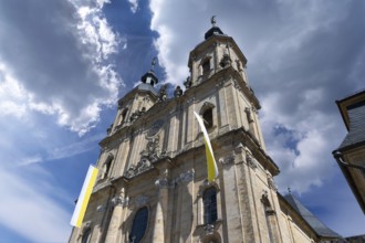 Parish and pilgrimage church of the Holy Trinity, basilica in Gößweinstein with pilgrimage flags,