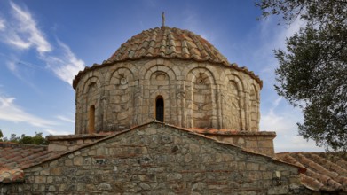 Stone church with dome in Byzantine style in front of a clear blue sky, sky exchanged, Monastery