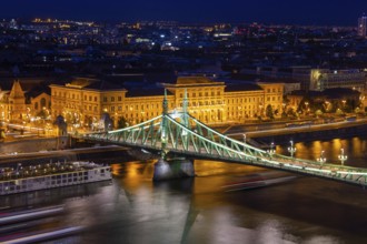 Evening panorama of Budapest with the Danube and the Liberty Bridge in the foreground