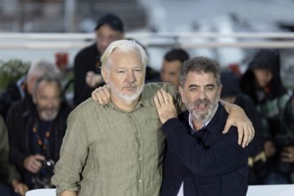 Cannes, France - 20.5.2024: Eugene Jarecki and Julian Assange during the - The Six Billion Dollar