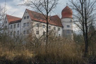 Moated castle, originally a manor house, converted into a Renaissance castle between 1612 and 1618,