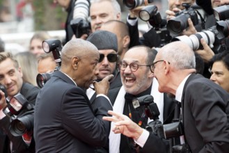 Cannes, France - 19.5.2024: Denzel Washington jokes with photographers during the - Highest 2