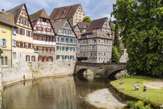 Town view with interesting half-timbered houses on the river Kocher. Historic old town centre of