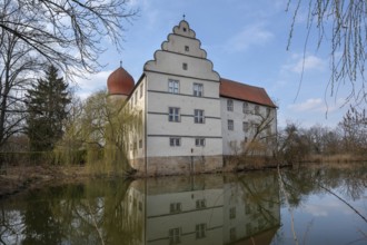 Moated castle, originally a manor house, converted into a Renaissance castle between 1612 and 1618,