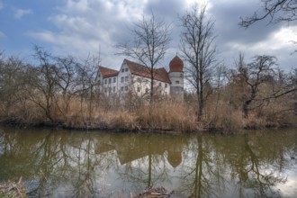 Moated castle, originally a manor house, converted into a Renaissance castle between 1612 and 1618,