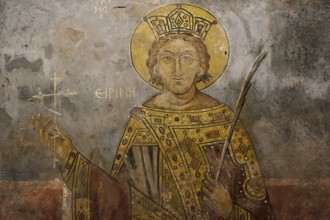 Image of a saint with a golden crown and halo on a church wall, Thari Monastery, Moni Thari, near