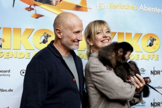 Benno Fürmann and Heike Makatsch at the Berlin premiere of AKIKO - DER FLIEGENDE AFFE at the