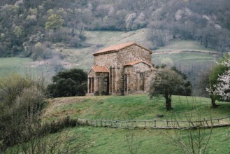 Exterior view of St Christine of Lena church at spring. Santa Cristina de Lena is a Catholic