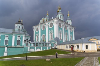 SMOLENSK, RUSSIA, APRIL 21, 2018: Uspensky cathedral against a background of dark thunderclouds.