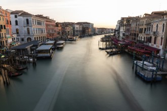 Evening light at sunset, view over the Grand Canal, from the Rialto Bridge, long exposure, Venice,
