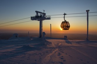 Cable Car Passes Setting Sun, Yllas, Finland, Europe