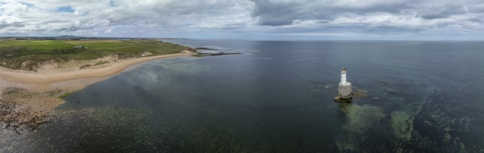 Lighthouse in the sea, drone shot, Rattray Head Lighthouse, Peterhead, Aberdeenshire, Scotland,