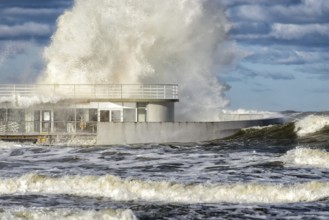 Large braking waves during a storm in Kolobrzeg on the Polish Baltic coast