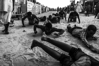 People crawling religious ritual ganga sagar kolkata west bengal India Asia