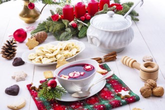 Barszcz (beetroot soup) with small pierogi