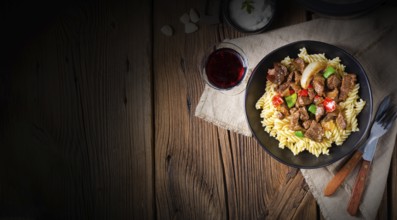 Fussili pasta with minced spiced goulash and paprika